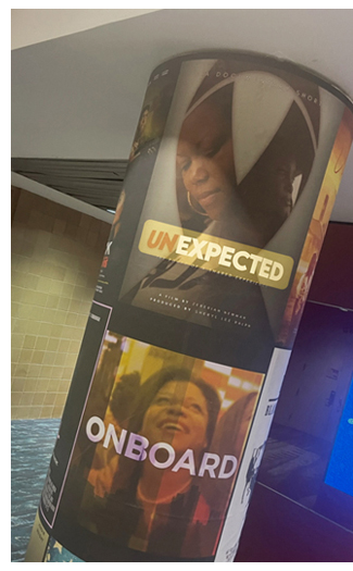 Unexpected documentary poster on column at the 2023 Essence Film Festival.