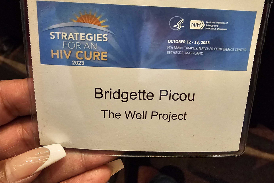 Nametag for Strategies for an HIV Cure 2023 conference that reads &quot;Bridgette Picou, The Well Project&quot;.