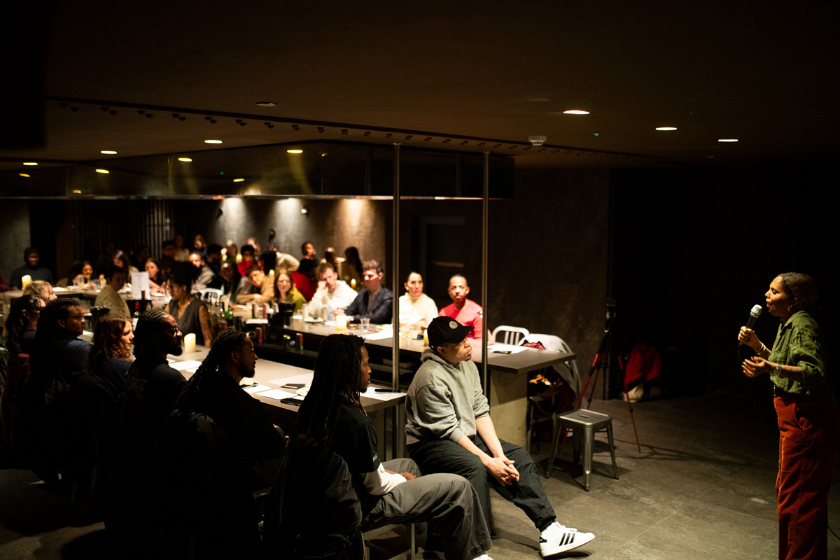 A Girl Like Me blogger Louise Vallace speaking to a group of people at an event.