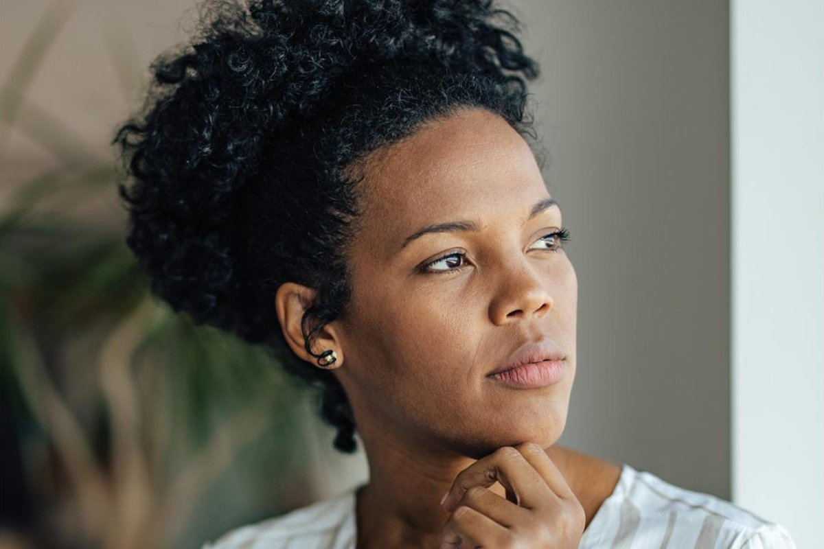 Woman looking to the side.