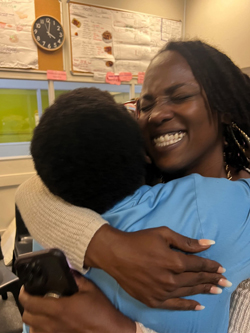 Ciarra "Ci Ci" Covin and another woman embracing.