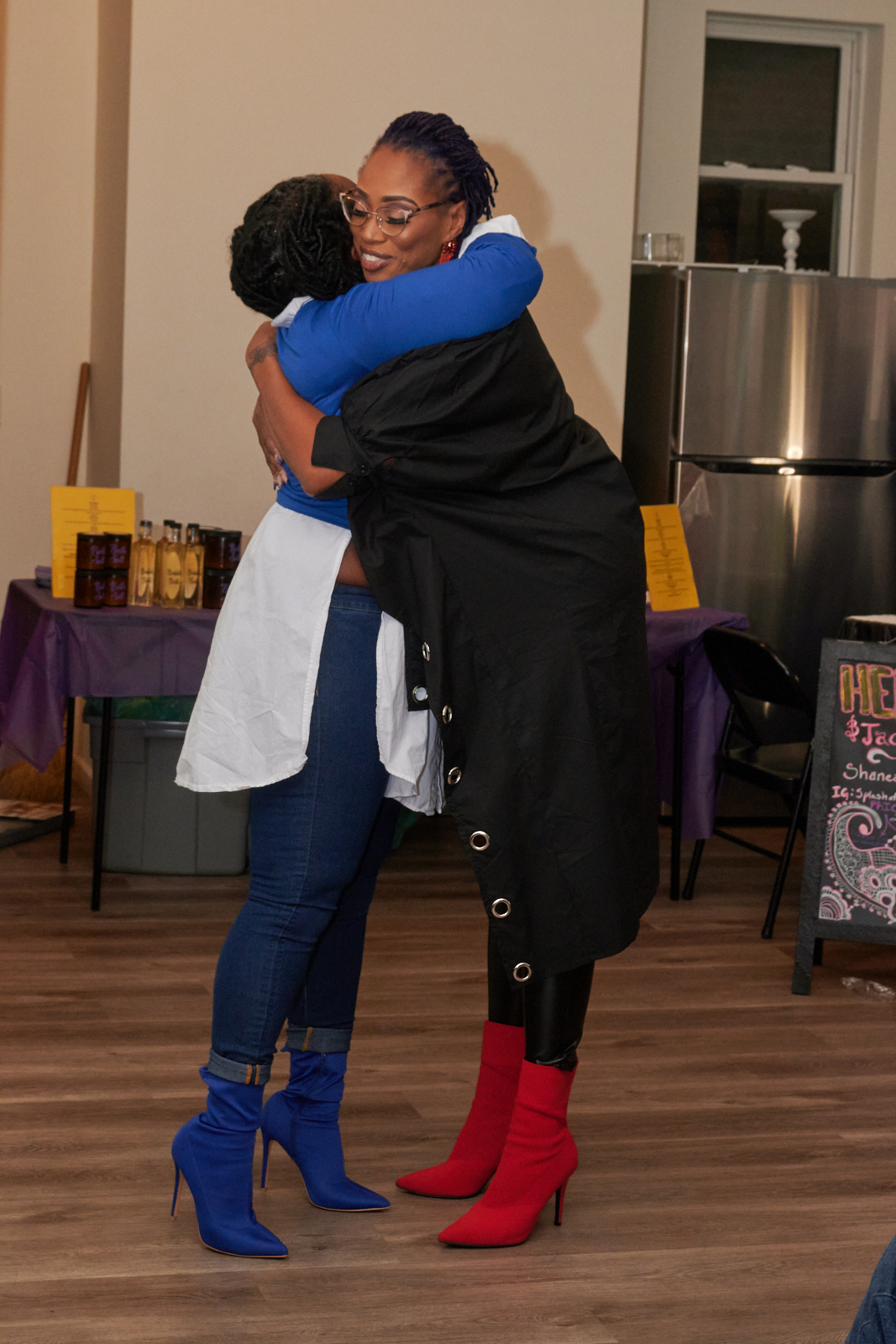 Lynette Trawick and another woman hugging each other.