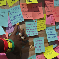Post-its on the wall.
