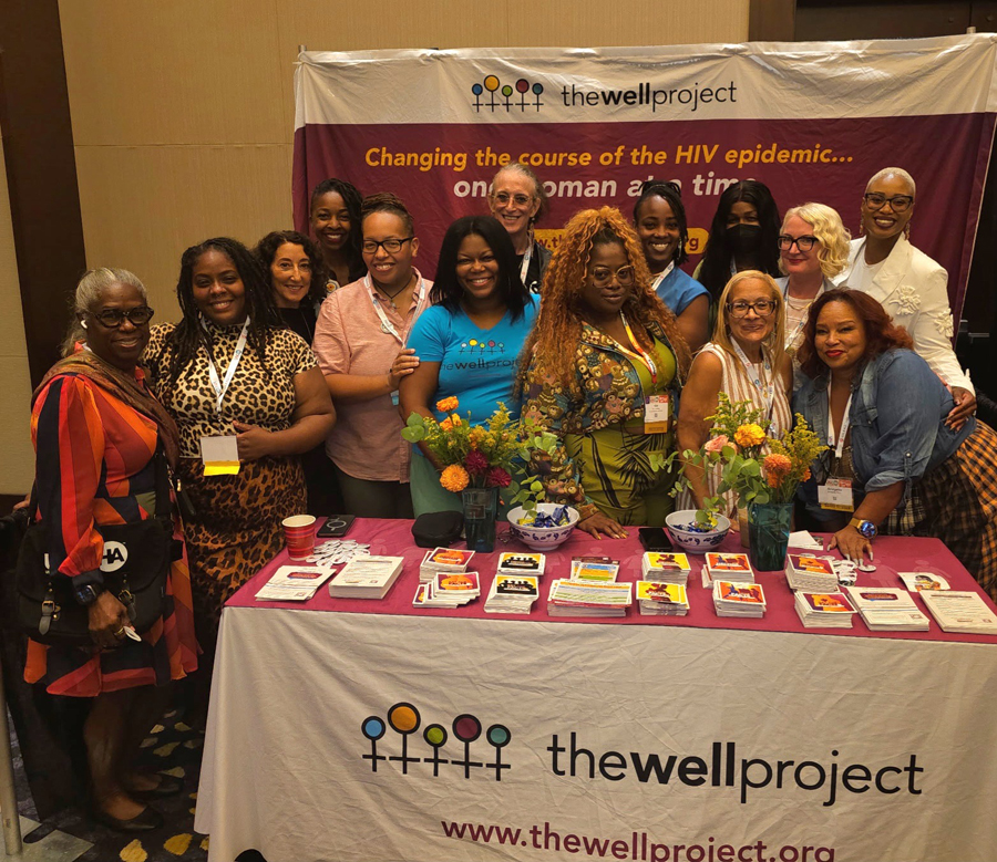 Community members at The Well Project's booth at 2025 USCHA. 
