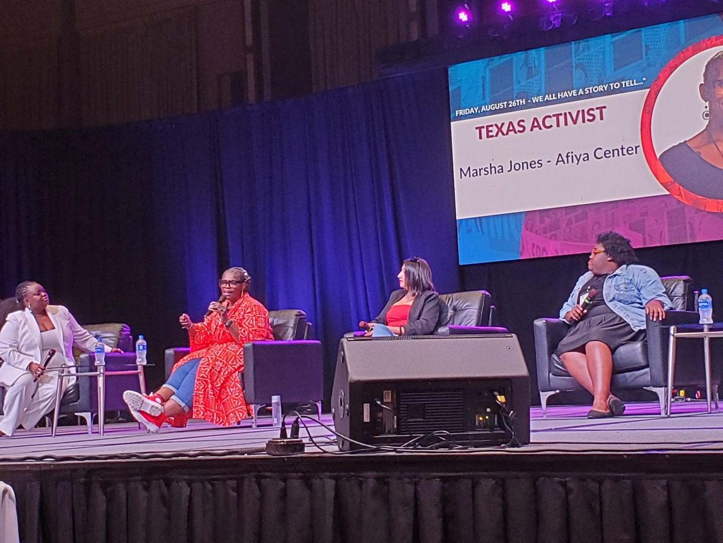Marsha Jones, Monica Raye Simpson, and Texas-based activists on plenary stage.