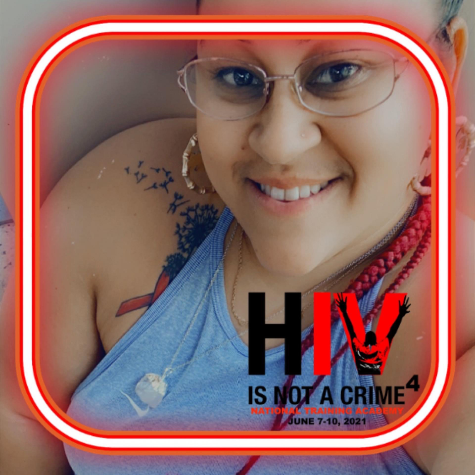Marissa Gonzalez and words &quot;HIV is not a crime.&quot;