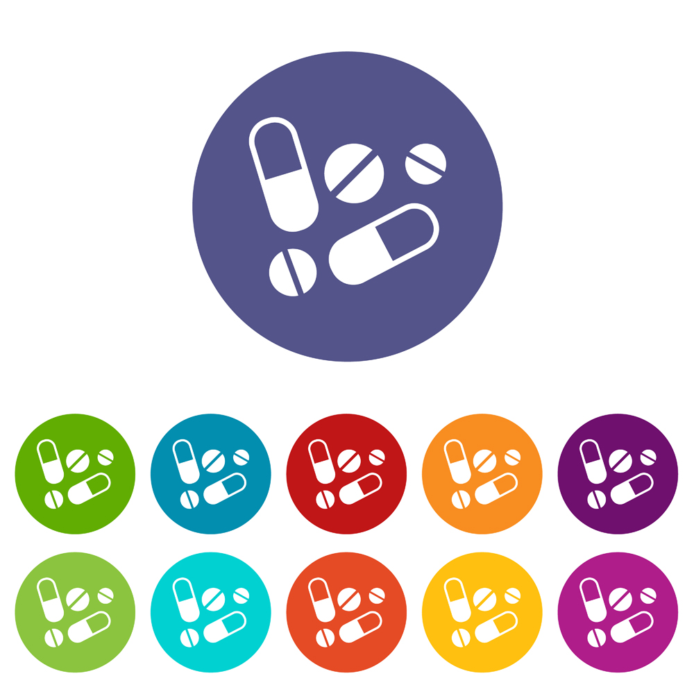 Representation of multiple pills inside multiple colored circles in a pattern.  
