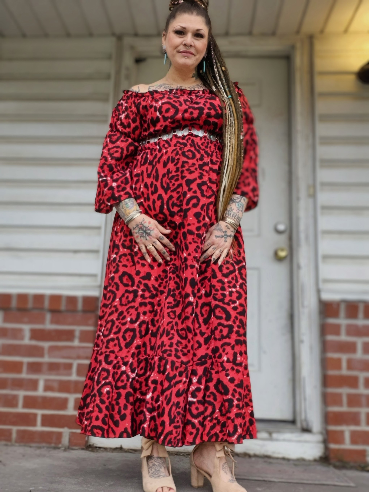 Blogger Cupcake80 in a red dress.