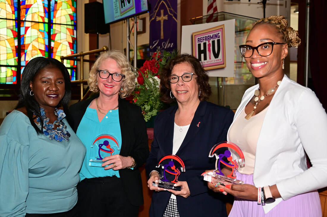 Summit honorees with Iris House executive director Ingrid Floyd.