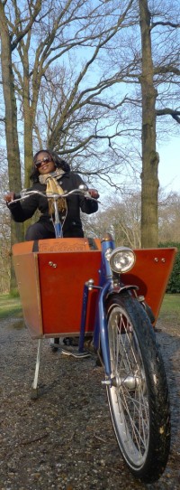 Eliane riding a bike.