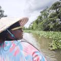 A Girl Like Me blogger HIVstigmafighter on a boat on the Mekong River.