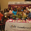 Community members at The Well Project's booth at 2025 USCHA. 
