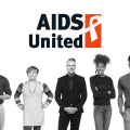 AIDS United logo and 7 people standing in a row.