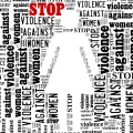 Simple representation of a woman with words "Stop Violence Against Women" all around it.