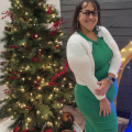 A Girl Like Me blogger Marig2016 standing in front of a Christmas Tree.